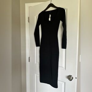 J Crew  mid calf fitted dress . I’m a size 2 and this fits good. XXS  brand new